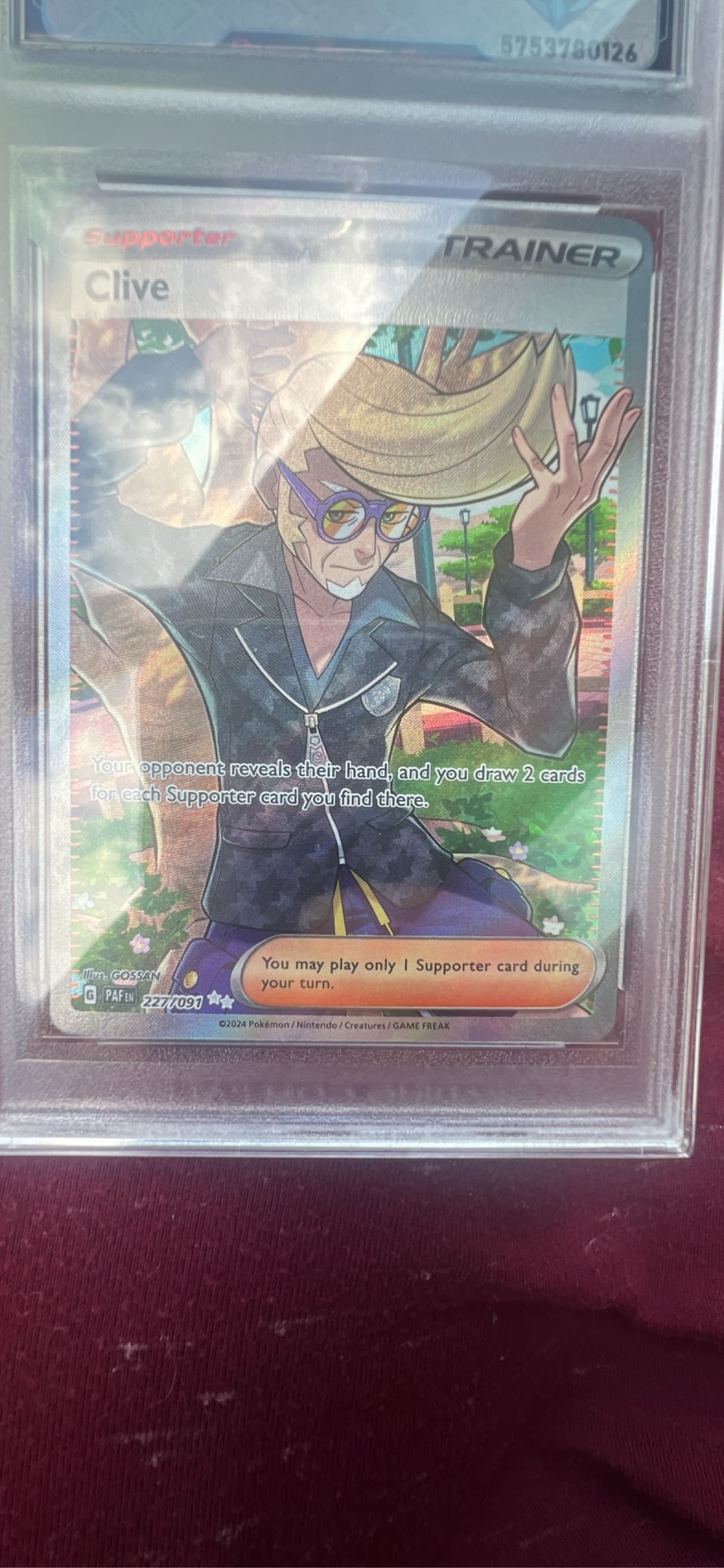 clive pokemon card 227/091 Paldean Fates OV Games LLC holofoil pattern or surface detail) PSA 9 Clive Special Illustration