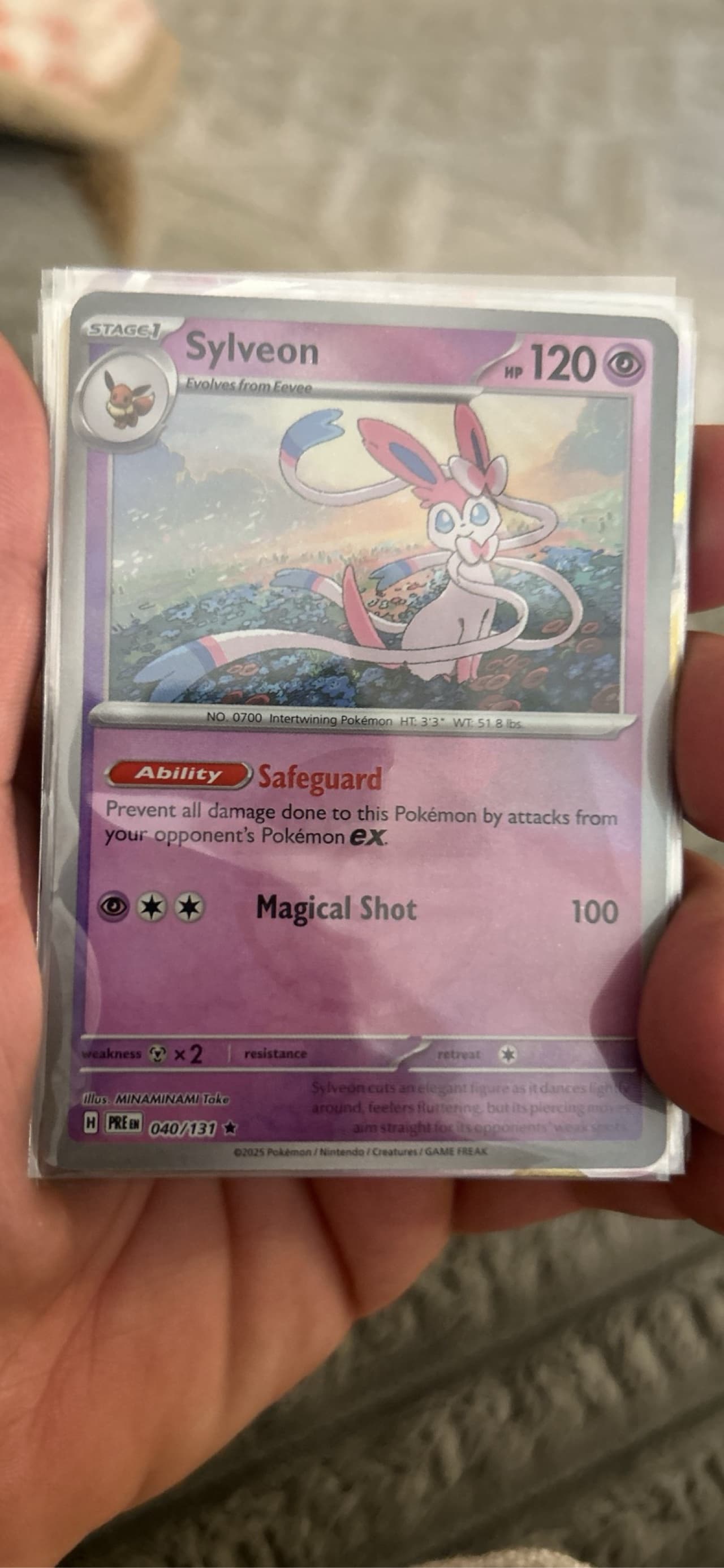 holographic sylveon pokemon card V - Psychic attacks used by the Defending Pokemon do 100 less damage (before applying Weakness and Resistance) Pokemon - Sylveon V -