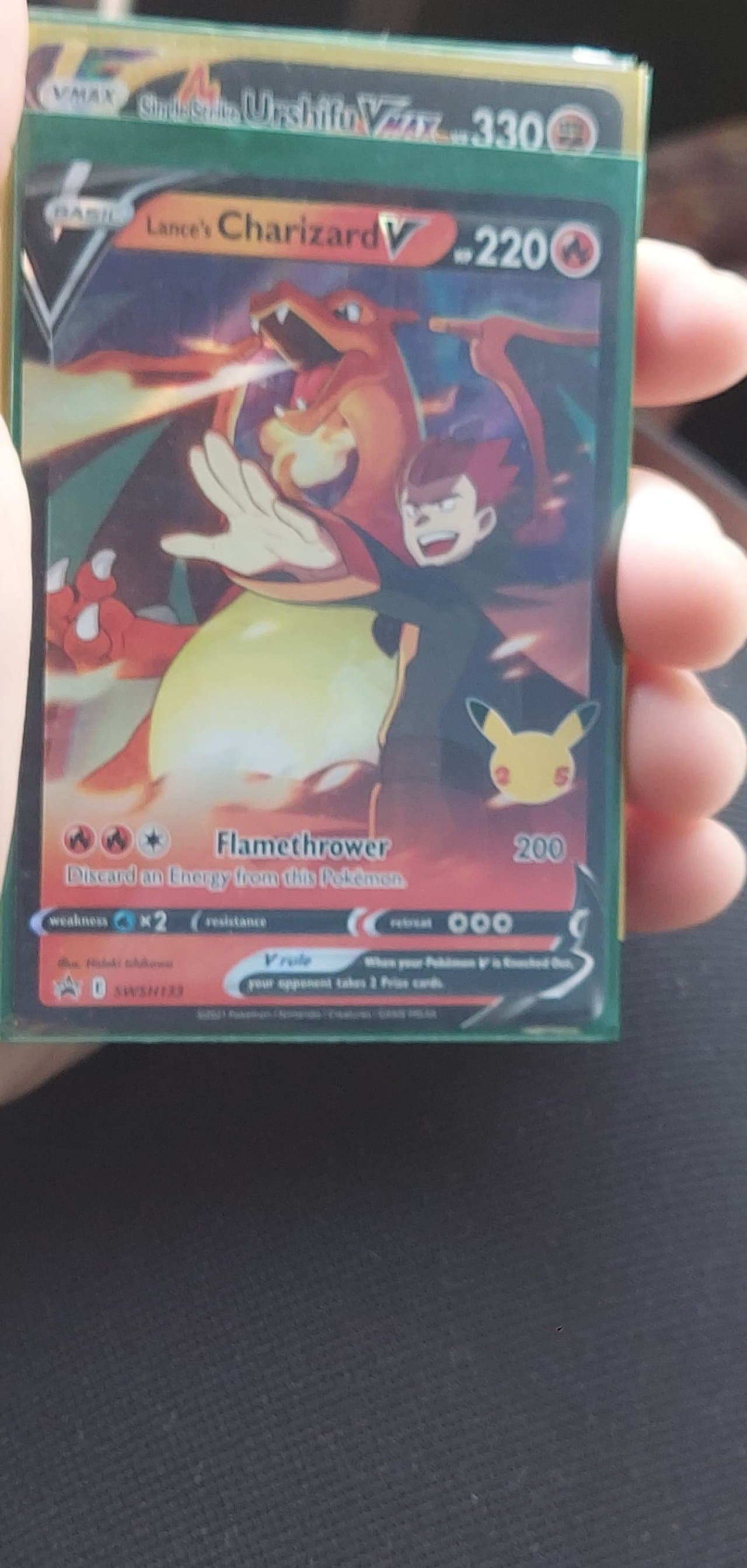 pokemon cards lance's charizard SWSH133 - Black Star Promo - Celebration Card Promo Card Type Lance's Charizard V SWSH133 -